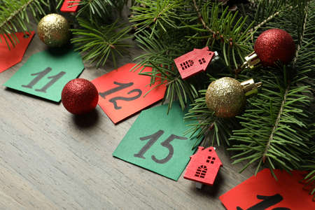 Advent calendar composition on wooden background, close up.の写真素材