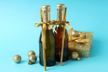New Year celebration concept with champagne on blue background.の写真素材