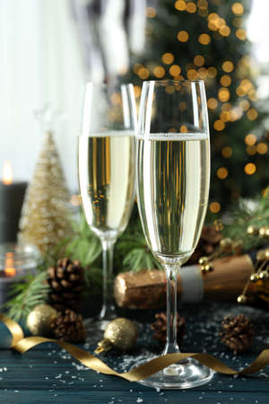 Concept of New Year celebration with champagne on wooden table.の写真素材