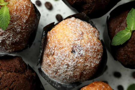 Concept of delicious food with chocolate muffins, top view.の写真素材