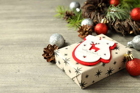Christmas accessories on wooden background, space for text.の写真素材