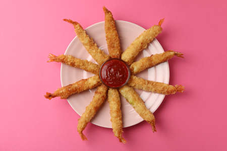 Ð¡oncept of tasty food with deep-fried shrimp on pink backgroundの写真素材