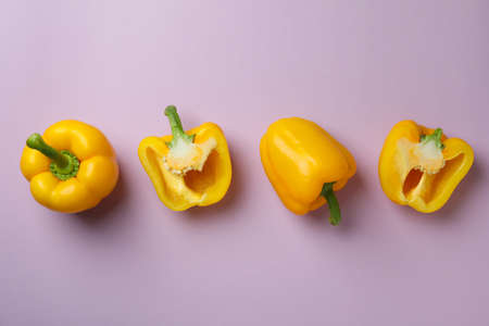 Flat lay composition with bell pepper on purple backgroundの写真素材