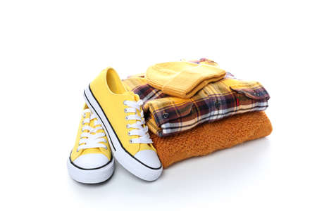 Winter clothes and sneakers isolated on white background.の写真素材