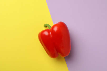 Red bell pepper on two color backgroundの写真素材