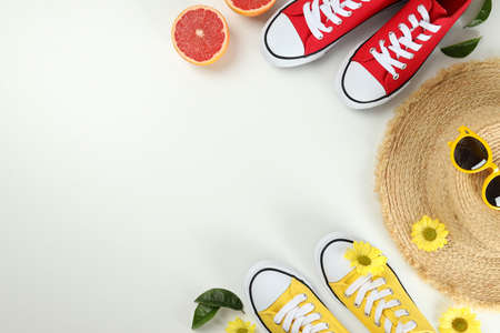 Summer clothes concept with sneakers on white backgroundの写真素材