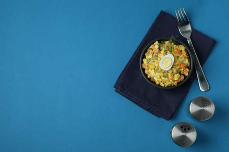 Concept of tasty food with Olivier salad on blue backgroundの写真素材