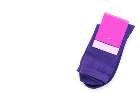 Blank pack of violet socks isolated on white backgroundの写真素材