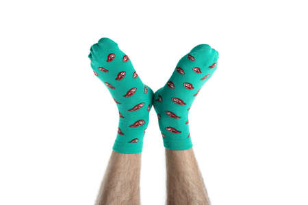 Male legs in funny socks isolated on white backgroundの写真素材