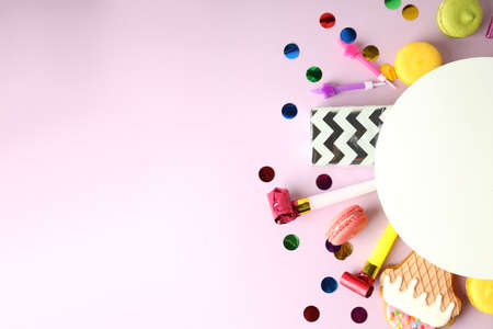 Birthday accessories on light violet background, space for text