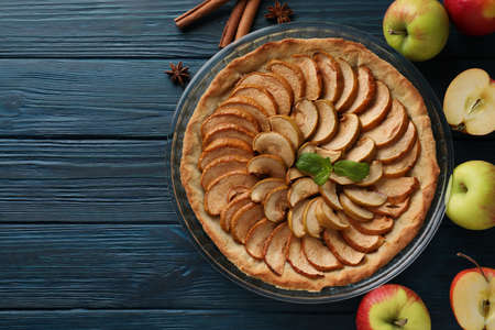 Concept of tasty food with apple pie on wooden backgroundの写真素材