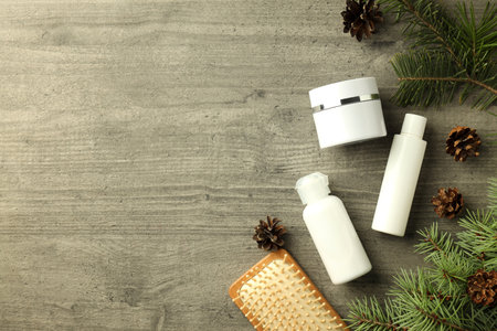 Composition with winter cosmetic products on gray textured tableの写真素材