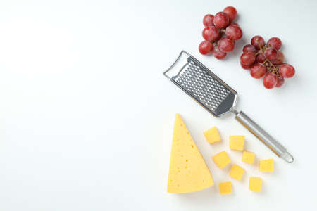 Concept of cooking eating with hard cheese on white background