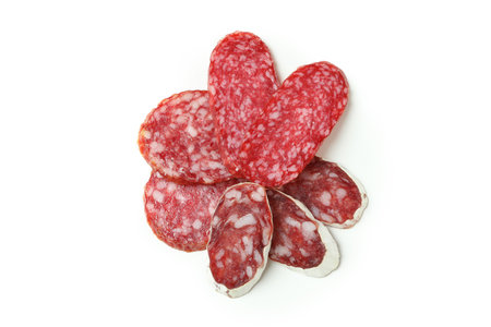 Slicing sausage salami isolated on white backgroundの写真素材