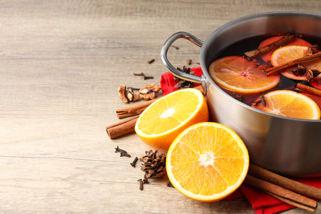 Concept of cooking mulled wine on wooden backgroundの写真素材