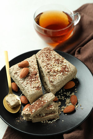 Concept of tasty food with halva on white textured backgroundの写真素材