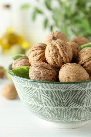 Concept of healthy food with walnuts on white wooden backgroundの写真素材