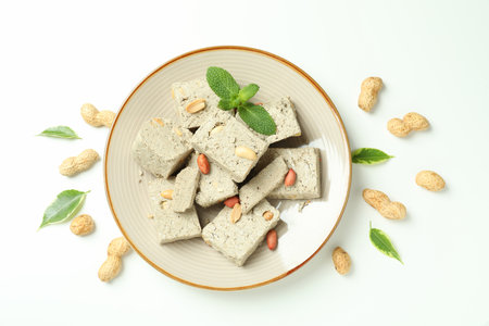 Concept of tasty food with halva on white background