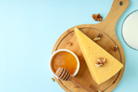 Concept of cooking eating with hard cheese on blue backgroundの写真素材