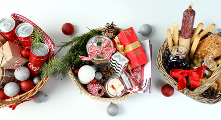 Odessa, Ukraine - November 10, 2021: Concept of gift with Christmas basket on white backgroundのeditorial素材