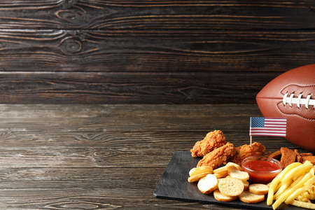 Concept of Super bowl snacks on dark tableの写真素材