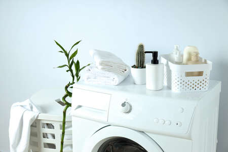 Concept of housework with washing machine on white backgroundの写真素材