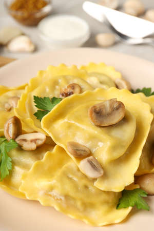 Delicious food concept with ravioli on textured tableの写真素材