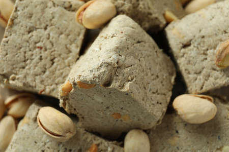 Halva with pistachio all over background, close up