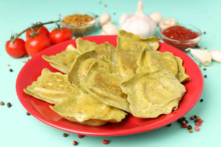 Delicious food concept with ravioli on white background