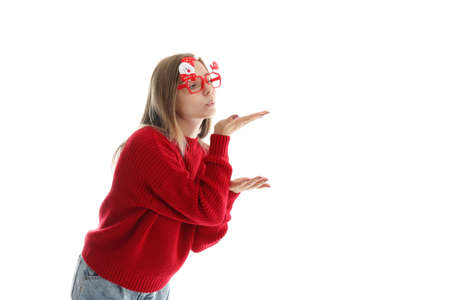 Attractive girl isolated on white background, Christmas conceptの写真素材