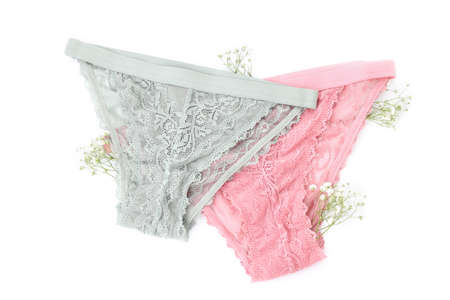 Concept of womens clothes with underwear isolated on white background