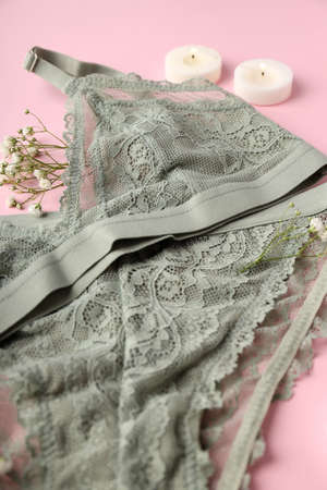 Concept of women's clothes with underwear on pink backgroundの写真素材