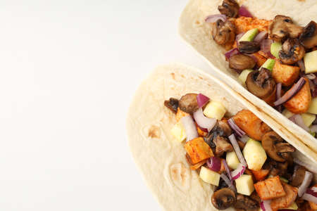 Concept of tasty food with taco on white backgroundの写真素材
