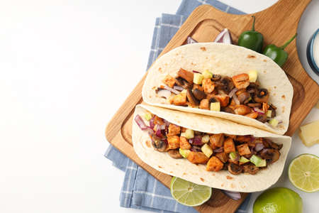 Concept of tasty food with taco on white backgroundの写真素材