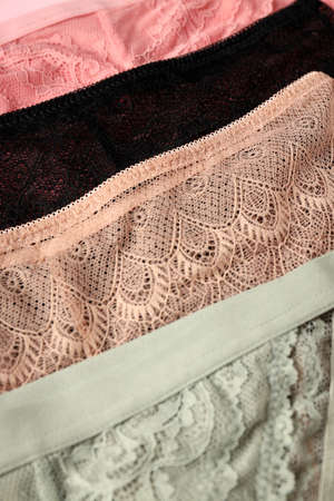 Beautiful womens panties on pink background, close upの写真素材