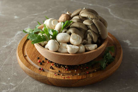 Concept of tasty food with mushrooms on gray textured backgroundの写真素材