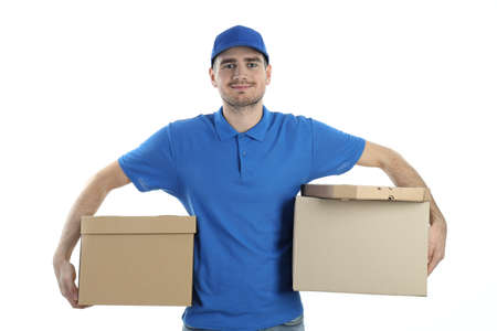 Delivery man holds boxes, isolated on white background