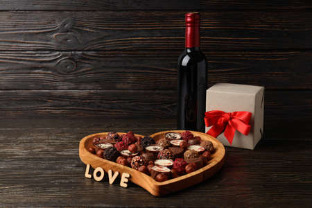 Happy Valentine day composition on dark wooden tableの写真素材