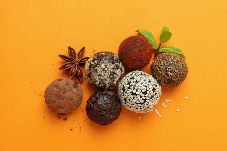 Concept of sweets with truffles on orange backgroundの写真素材
