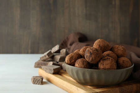 Concept of sweets with truffles on white wooden tableの写真素材