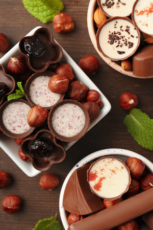 Concept of sweets with chocolate candies on wooden backgroundの写真素材