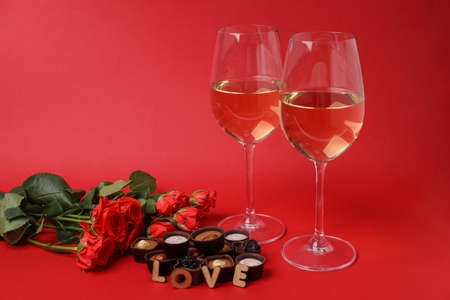 Happy Valentine day composition on red backgroundの写真素材