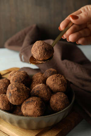 Concept of sweets with truffles on white wooden tableの写真素材