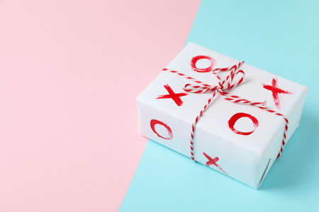 Gift box with XO on two tone backgroundの写真素材