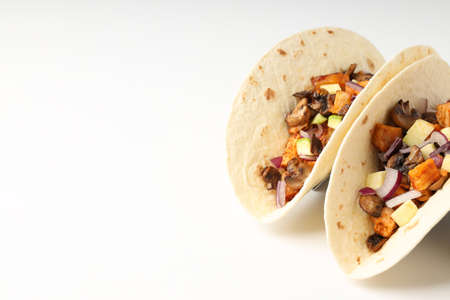 Concept of tasty food with taco on white backgroundの写真素材