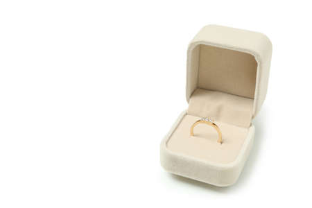 Wedding ring in box isolated on white background