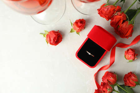 Concept of wedding accessories with wedding ring, close up