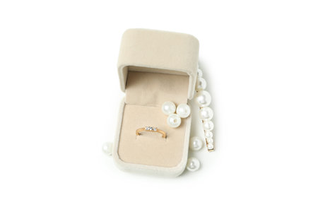 Wedding ring in box isolated on white background