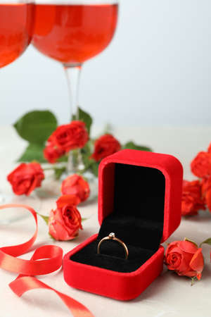 Concept of wedding accessories with wedding ring, close up