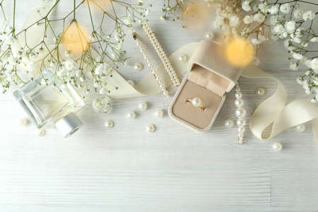 Concept of wedding accessories with wedding ring, close upの写真素材